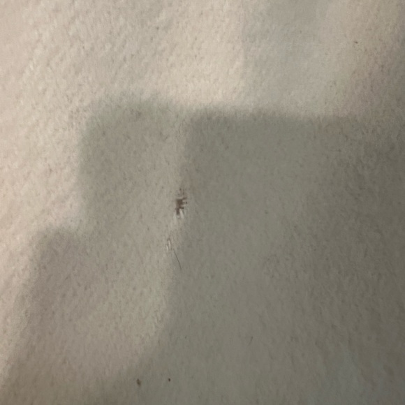 This is a white/cream wool vintage, long coat. Size 5/6. - Picture 10 of 11